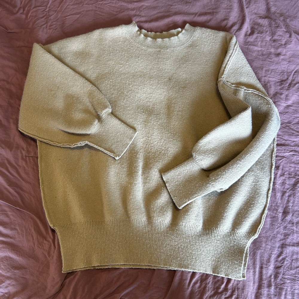 tan sweater